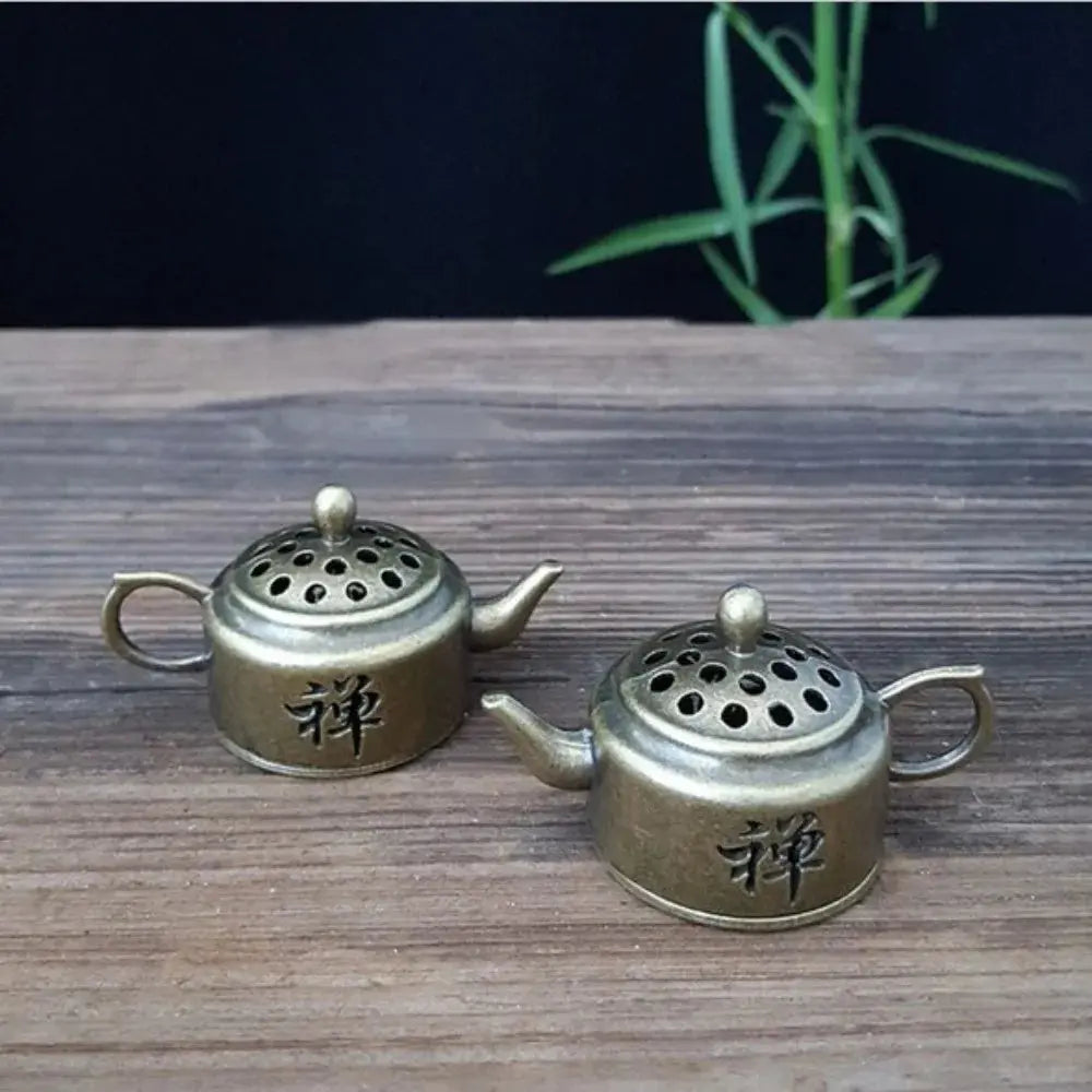 Brûleur encens théière en laiton mini, vue latérale avec finition brillante.