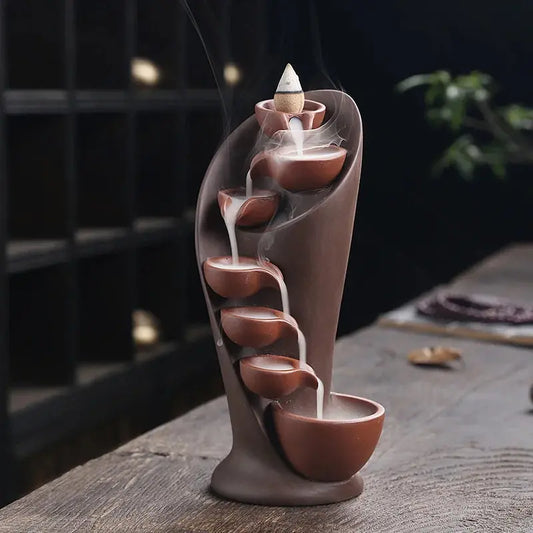 Accessoire de relaxation avec effet fumée cascade pour cônes à reflux.
