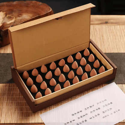 Boîte 32 cônes encens tradition chinoise, conditionnement sobre santal et bois d'agar