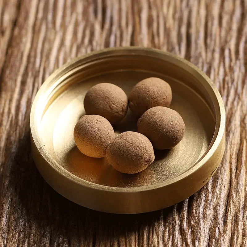 boules de santal parfumées en flacon