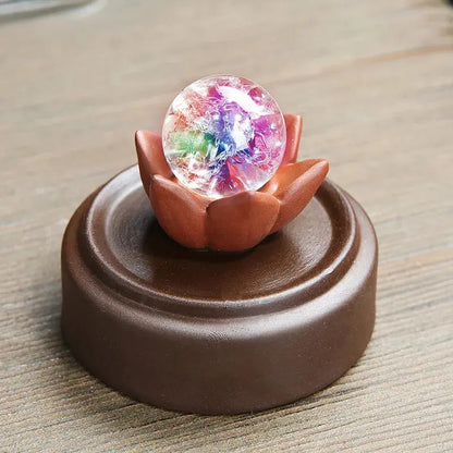 Brûleur encens avec boule cristal et lumière dans lotus
