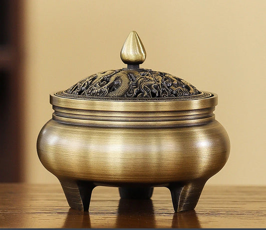Brûleur d’encens en cuivre tripode, fusion de tradition et modernité.