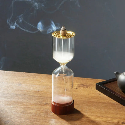 Brûleur encens sablier en verre transparent et lotus doré, effet cascade fumée méditation