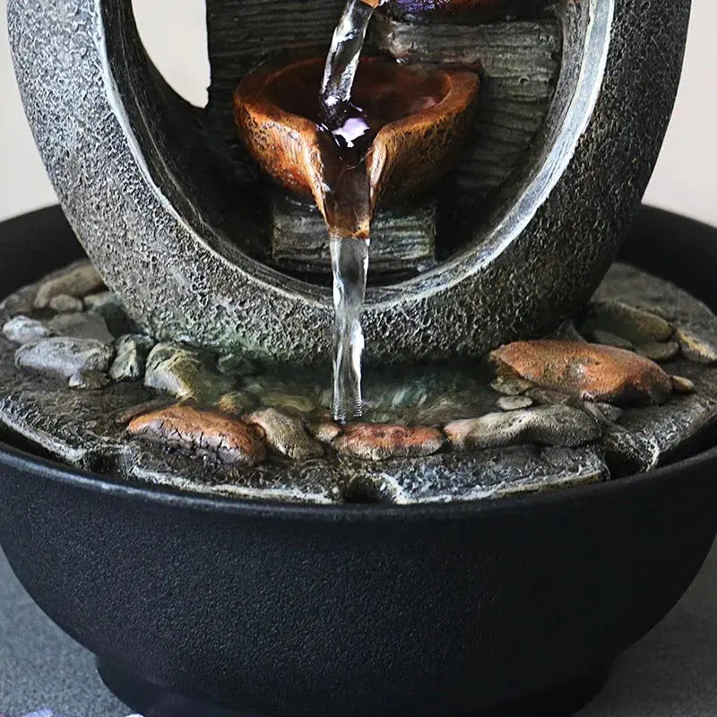 Fontaine d’intérieur zen avec emplacements bougies