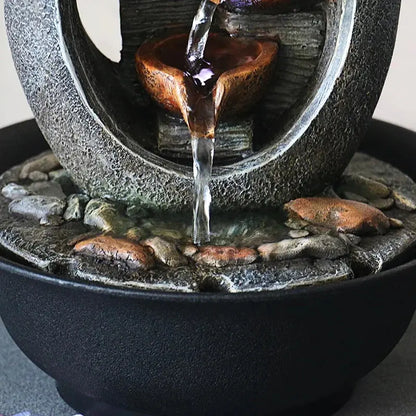 Fontaine d’intérieur zen avec emplacements bougies