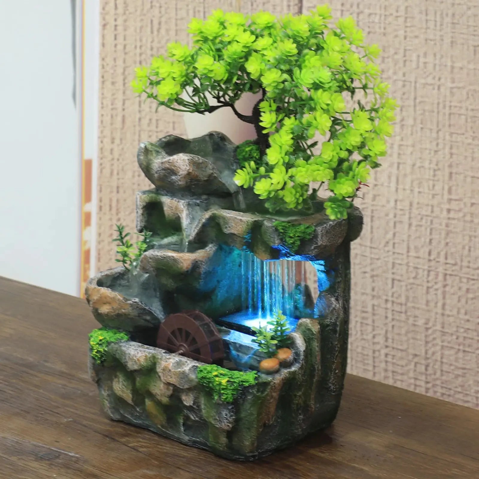 Fontaine décorative d’intérieur avec arbre et cascade