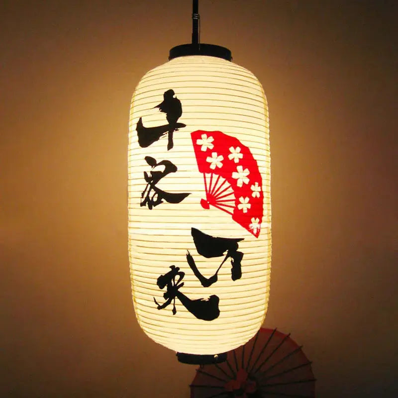 Lanterne japonaise cylindrique noire et blanche avec calligraphie traditionnelle